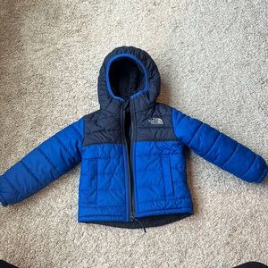 North face, like few 18-24 boys toddler reversible navy jacket.